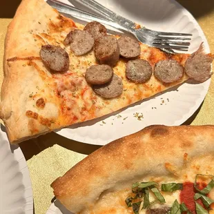 Cheese pizza with a side of sausage