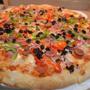 TEFLON DON - Pepperoni, Italian sausage, Canadian bacon, bell peppers, red onion, black olives