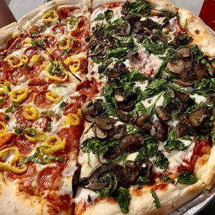 They do 1/2 &apos;n 1/2 pizzas! This is 1/2 fungus among us 1/2 custom pepperoni, banana peppers, basil.  September 2023