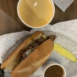 a sandwich and a cup of coffee