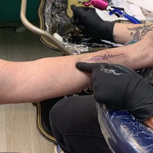 The unalome tattoo done by Garrett