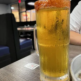  a glass of beer on a table