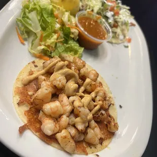 Camaron Enchilado Taco (back)  Quesito de Camaron (front)