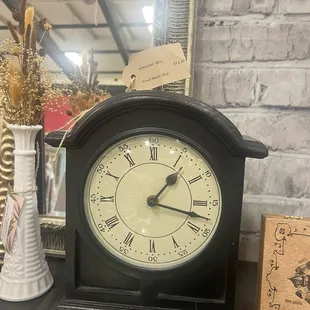 Cool antique booth with a neat mantel clock