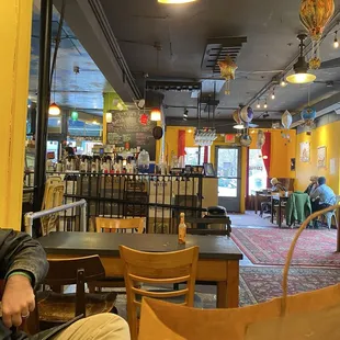 Cheery yellow walls in the cozy cafe