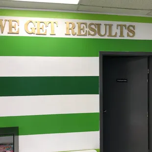 a green and white striped wall