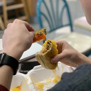 a person eating a sandwich