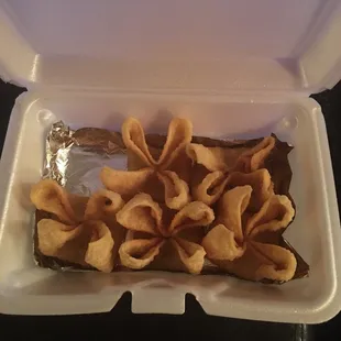 Crab Rangoon, missing one, because I'm hangry!