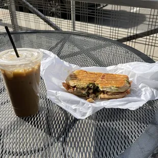 Iced vanilla latte and a panini