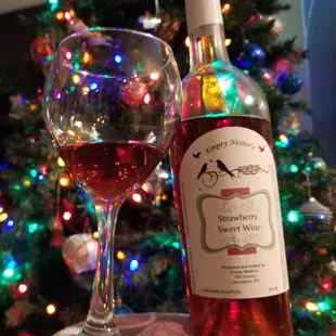 a glass of wine and a bottle of wine