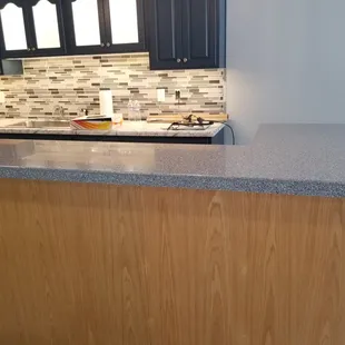 a kitchen counter with a sink