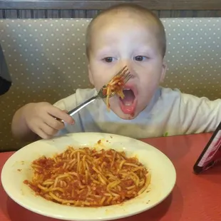 My little godson loved the spaghetti. He's so cute when he feeds himself.