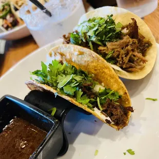 Carnitas taco and queso birra taco