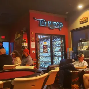 a group of people sitting at tables