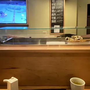 a bowl of soup and chopsticks