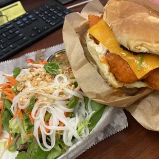 Buffalo chicken tender sandwich and a side salad. (And my keyboard)