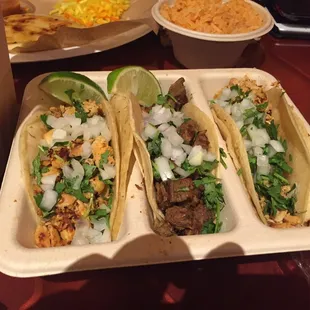 Two steak tacos one chicken taco