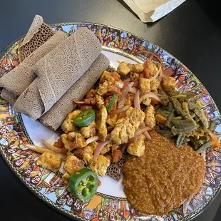 Ordered the Classic Tibs with sides Fosolia (green verbs) Side Miser (red lentil stew) Teff Enjera (spongey bread)