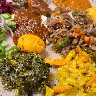 Passport Plate, veggie plate with one protein and we order the Doro Wat (chicken). This is for 4. Great value.