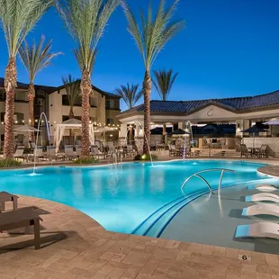Encantada Continental Reserve pool with lagoon, entertainment ramada, cabanas, and lot's of lounge seating.