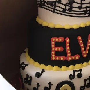 Elvis cake which shows the bottom layer starting to shift while STILL at the bakery.
