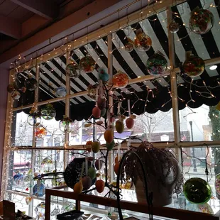 Front window full of beautiful glass balls