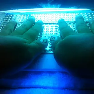 My sister is almost done with her nails by Tiff