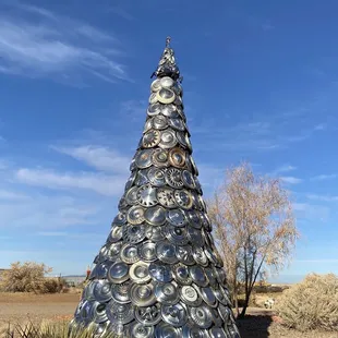 Cute hubcap Christmas tree that lit up at night