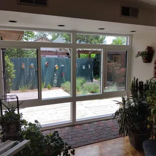 Enclose your patio slider into a window wall.