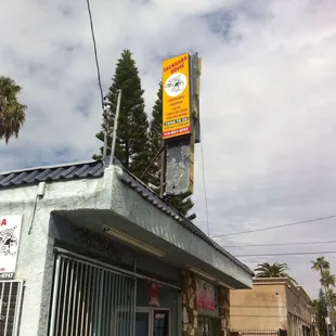 Advertising above and with the Enchilada House Logo.