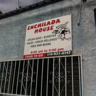 Enchilada House Advertising Sign on the side of the Business.