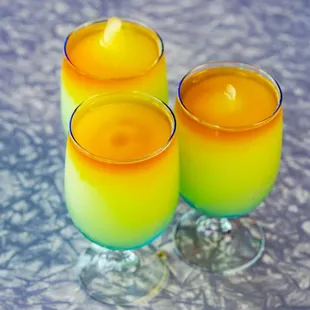 three glasses of orange juice