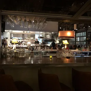 View of the bar and kitchen beyond