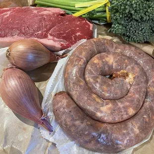 Take home on the lucky day. Harris Ranch Strip and homemade Scalise Hot Italian Sausage.