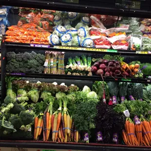 Fresh organic bunch carrot  and so many varieties of fresh organic produce, they even have frisée