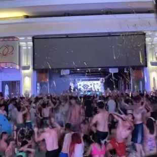 a large crowd of people dancing
