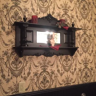 The bathroom is filled with antiques.