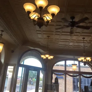 I visited Encore Coffee Cafe in an old remodeled bank building in St. James, MN.  It had tin ceiling with grand light fixtures.