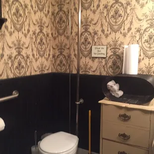 The bathroom in the Encore Coffee Cafe is like being in a museum.