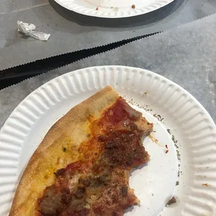 Meat lovers pizza with sprinkles of oregano. Delish!!