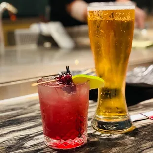 a glass of beer and a drink