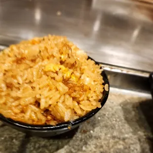 a bowl of rice and bread