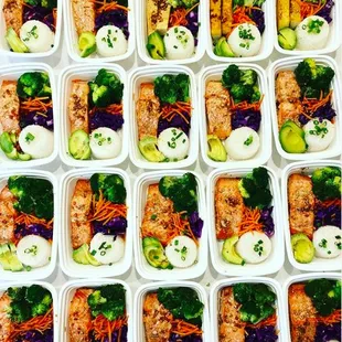 End Goal Teriyaki Salmon Bowl served with white rices, avocado, and steamed veggies.