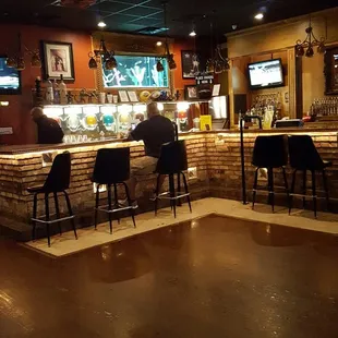 people sitting at the bar