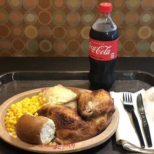 Baked chicken dinner with two sides: mashed potatoes and gravy and corn includes a dinner roll $10.99