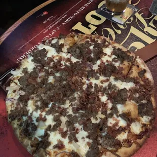 Bbq, sausage, and onion pizza