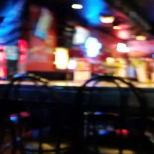 a blurry view of the bar