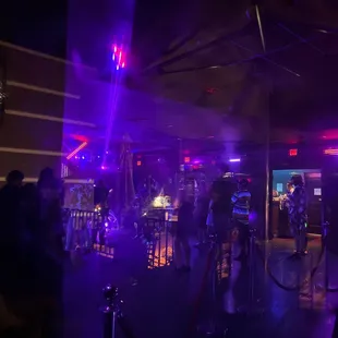 a crowd of people playing a video game