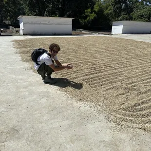 a man kneeling on the ground
