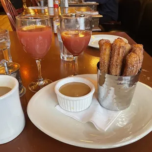 Citrus Burst Mimosas and Churros with Dulce De Leche sauce!